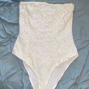 Women’s white lace body suit strapless top